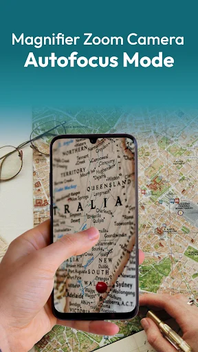Magnifier camera autofocus mode zooming in on map text with smartphone magnifying glass feature for document viewing