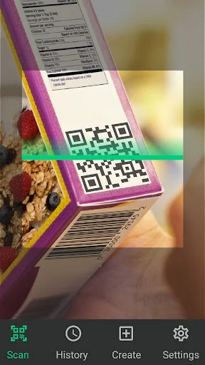 QR and barcode scanner app in real-world use scanning product packaging with visible Scan History Create Settings navigation menu